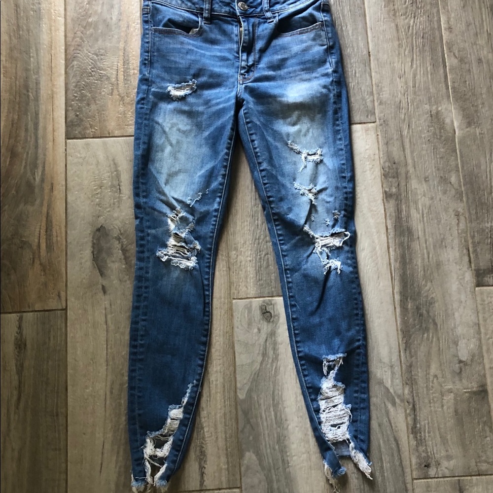 high-waisted ripped jeans
